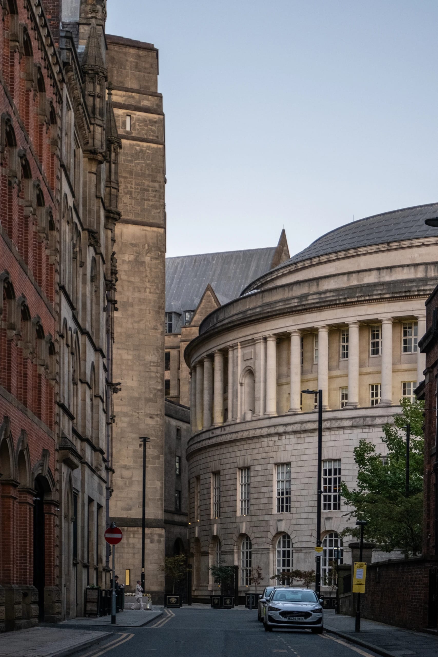 Manchester Central Library seen along a narrow street